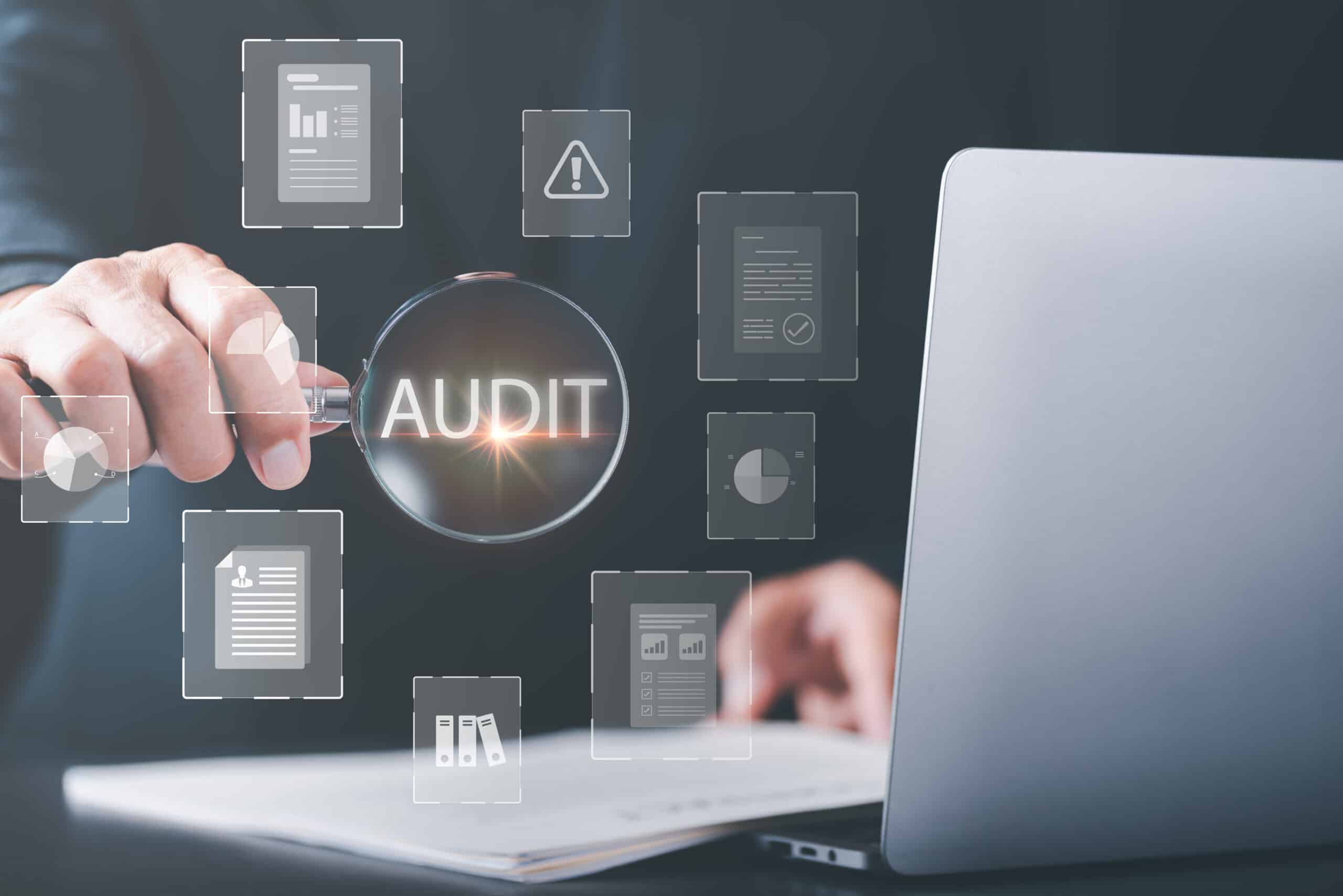 A businessman auditing documents for quality assessment and management.